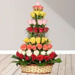 Joyful Collection of Mixed Roses in Tall Rounded Basket to Cooch behar