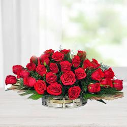 Silky-Smooth Red Roses Arrangement in a Basket to Darjiling Silky-Smooth Red Roses Arrangement in a Basket to Darjiling