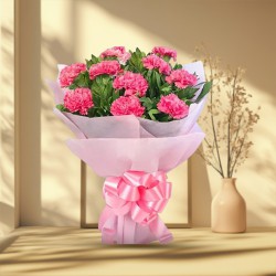 Deliver this petite Hand Bunch of Pink Carnations in Tissue Packing to Siliguri Deliver this petite Hand Bunch of Pink Carnations in Tissue Packing to Siliguri