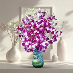 Eye-Catching Arrangement of Orchids in a Glass Vase to Burdwan Eye-Catching Arrangement of Orchids in a Glass Vase to Burdwan