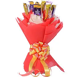 Yummy Assemblage of Cadbury Five Star N Dairy Milk Chocolates in a Hand Bunch Yummy Assemblage of Cadbury Five Star N Dairy Milk Chocolates in a Hand Bunch