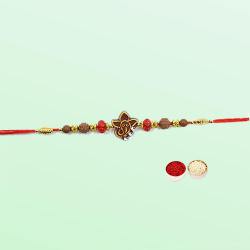Breathtaking Rakhi with Ganesha in the Centre Breathtaking Rakhi with Ganesha in the Centre