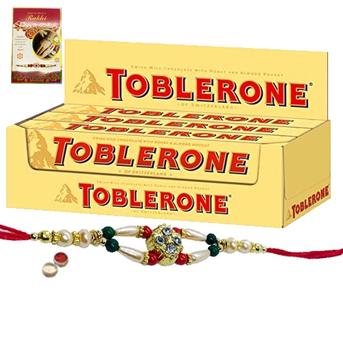Delightful Toblerone with Free Nice Rakhi, Roli , Tilak and Chawal Delightful Toblerone with Free Nice Rakhi, Roli , Tilak and Chawal