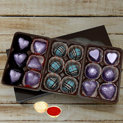Mouthwatering Pack of 18pcs Assorted Homemade Chocolate. with free Roli Tilak and Chawal. Mouthwatering Pack of 18pcs Assorted Homemade Chocolate. with free Roli Tilak and Chawal.