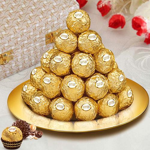 Daintily Arranged Ferrero Rocher Chocolates in a Golden Plated Thali Daintily Arranged Ferrero Rocher Chocolates in a Golden Plated Thali