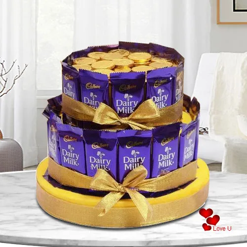Luscious Tower Arrangement of Cadbury Dairy Milk with Gold Coin Chocolates