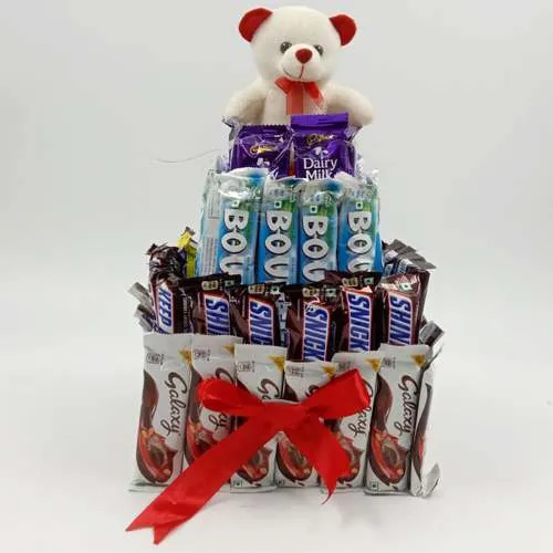 Enigmatic 4 Layer Tower Arrangement of Mixed Chocolates n Teddy