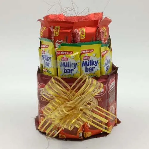 Delightful 3 Layer Tower Arrangement of Nestle Chocolates Delightful 3 Layer Tower Arrangement of Nestle Chocolates