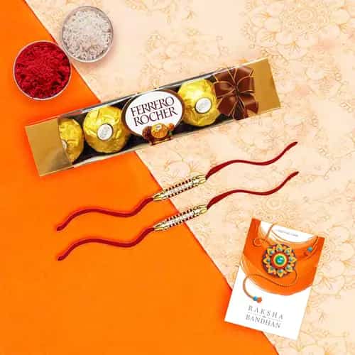 4 pcs Ferrero Rocher Chocolate Pack with 2 Rakhis and Roli Tilak Chawal 4 pcs Ferrero Rocher Chocolate Pack with 2 Rakhis and Roli Tilak Chawal