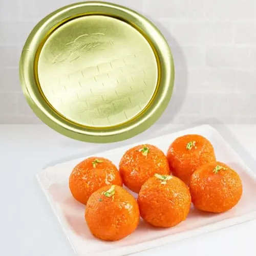 Lovely Pure Ghee Laddu from Haldiram with Golden Plated Thali Lovely Pure Ghee Laddu from Haldiram with Golden Plated Thali