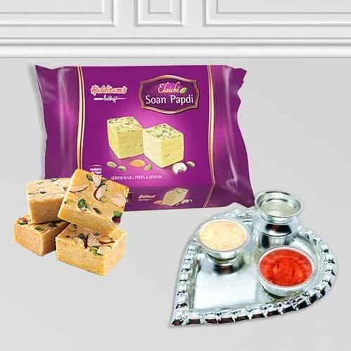 Silver Plated Paan Shaped Puja Aarti Thali (weight 52 gms) with Soan Papdi from Haldiram Silver Plated Paan Shaped Puja Aarti Thali (weight 52 gms) with Soan Papdi from Haldiram