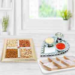 Silver Plated Paan Shaped Puja Aarti Thali (weight 52 gms) with Assorted Dry fruits with Haldiram Kaju Katli Silver Plated Paan Shaped Puja Aarti Thali (weight 52 gms) with Assorted Dry fruits with Haldiram Kaju Katli
