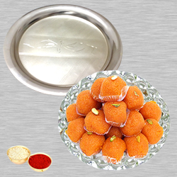 Haldiram Ladoo N Silver Thali with Roli Tilak and Chawal Haldiram Ladoo N Silver Thali with Roli Tilak and Chawal