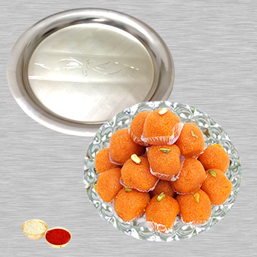 Haldiram Ladoo N Silver Thali with Roli Tilak and Chawal Haldiram Ladoo N Silver Thali with Roli Tilak and Chawal
