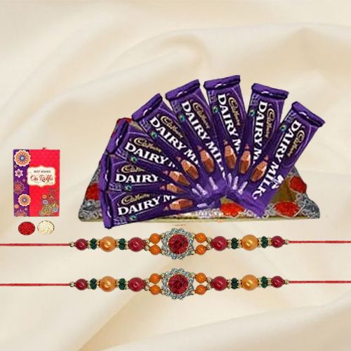 Zesty Selection of 8Pcs Cadbury Dairy Milk Chocolates with 2 Designer Rakhi and Roli Tilak Chawal Zesty Selection of 8Pcs Cadbury Dairy Milk Chocolates with 2 Designer Rakhi and Roli Tilak Chawal