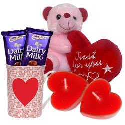 Valentine’s Day Combo of Teddy with Heart, Cadbury Chocolates, Heart Shape Candle n a Love Mug Valentine’s Day Combo of Teddy with Heart, Cadbury Chocolates, Heart Shape Candle n a Love Mug