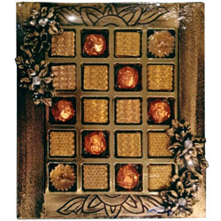 Delightful Fusion of Assorted Hand-made Chocolates with Diya Candles Delightful Fusion of Assorted Hand-made Chocolates with Diya Candles