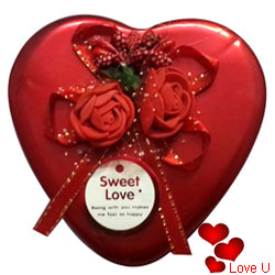 Romantic Gift of Assorted Handmade Chocolates in a Heart Shaped Gift Box Romantic Gift of Assorted Handmade Chocolates in a Heart Shaped Gift Box