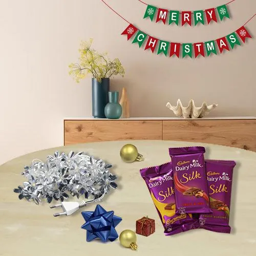 Impressive String Lights n Merry Christmas Banner with Cadbury Chocolates Impressive String Lights n Merry Christmas Banner with Cadbury Chocolates