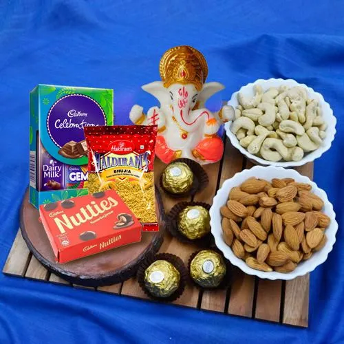 Angelic Gift of Marble Ganesha with Dry Fruits, Chocolates n Snacks Angelic Gift of Marble Ganesha with Dry Fruits, Chocolates n Snacks