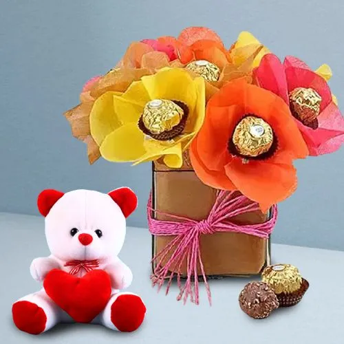 Beautifully Embellished Ferrero Rocher in Glass Vase with Teddy Beautifully Embellished Ferrero Rocher in Glass Vase with Teddy