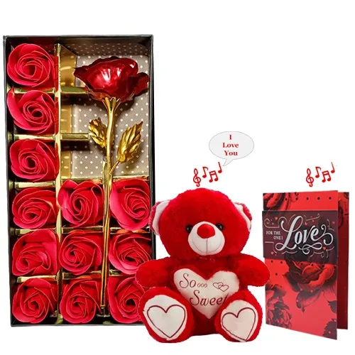 Classy Arrangement of Artificial Red Roses with Musical Teddy N Card
