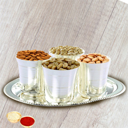 Crunchy mixed Dry Fruits with Silver Glasses and Tray with free Roli Tilak and Chawal Crunchy mixed Dry Fruits with Silver Glasses and Tray with free Roli Tilak and Chawal