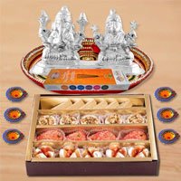Diwali Puja Thali Hamper with Assorted sweets from Haldirams and Silver Plated Ganesh Lakshmi Diwali Puja Thali Hamper with Assorted sweets from Haldirams and Silver Plated Ganesh Lakshmi