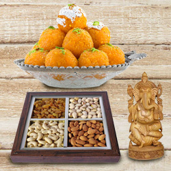 Lovely Sandalwood Ganesha and 250 gms. each of Dry Fruits and Haldiram's Ladoo Lovely Sandalwood Ganesha and 250 gms. each of Dry Fruits and Haldiram's Ladoo