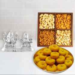 Beautiful Silver Plated Ganesh Lakshmi with Sweets and Dry Fruits Beautiful Silver Plated Ganesh Lakshmi with Sweets and Dry Fruits