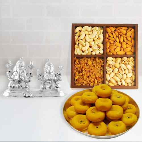 Beautiful Silver Plated Ganesh Lakshmi with Sweets and Dry Fruits Beautiful Silver Plated Ganesh Lakshmi with Sweets and Dry Fruits