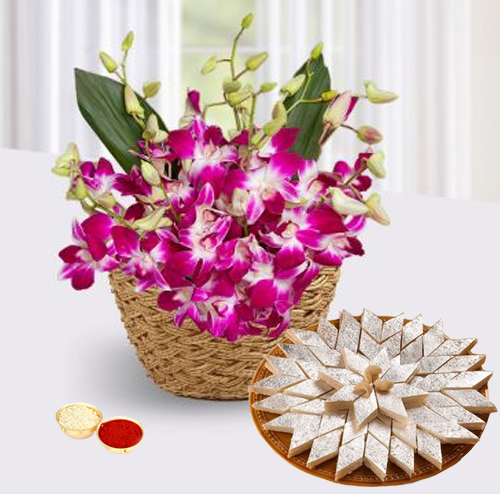 Orchids Basket and Kaju Katli Orchids Basket and Kaju Katli
