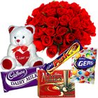 Small Teddy, Assorted Cadburys Chocolate and 12 Red Roses Bouquet Small Teddy, Assorted Cadburys Chocolate and 12 Red Roses Bouquet