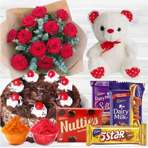 Awesome bouquet of Roses with a delicious Cake, mixed Cadburys Chocolate and lovely Teddy Bear Awesome bouquet of Roses with a delicious Cake, mixed Cadburys Chocolate and lovely Teddy Bear