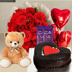Captivating Red Roses, Chocolate Cake, Mylar Balloons, Chocolates and a Teddy Captivating Red Roses, Chocolate Cake, Mylar Balloons, Chocolates and a Teddy
