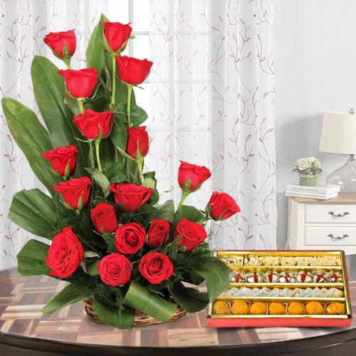 Fashionable Red Colored 18 Roses Bouquet with 1/2 Kg. Mixed Sweets Fashionable Red Colored 18 Roses Bouquet with 1/2 Kg. Mixed Sweets