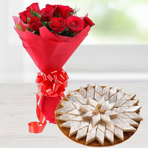 Lovely charming Red Roses combined with mouthwatering Kaju Katli Lovely charming Red Roses combined with mouthwatering Kaju Katli