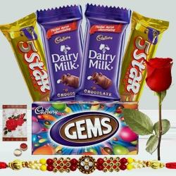 2 pcs Dairy Milk (13 gms each), 1 pc Gems, 2 pcs 5star, 1 Designer Rakhi with Single Red Rose 2 pcs Dairy Milk (13 gms each), 1 pc Gems, 2 pcs 5star, 1 Designer Rakhi with Single Red Rose