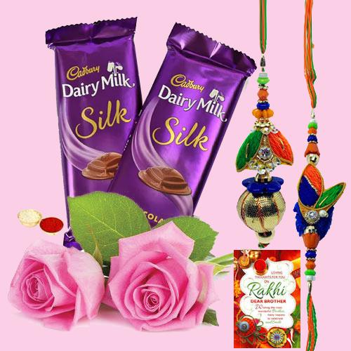 2 Dairy Milk Silk with Bhaiya Bhabhi Rakhi, 2 Pink Roses & Free Rakhi Card 2 Dairy Milk Silk with Bhaiya Bhabhi Rakhi, 2 Pink Roses & Free Rakhi Card
