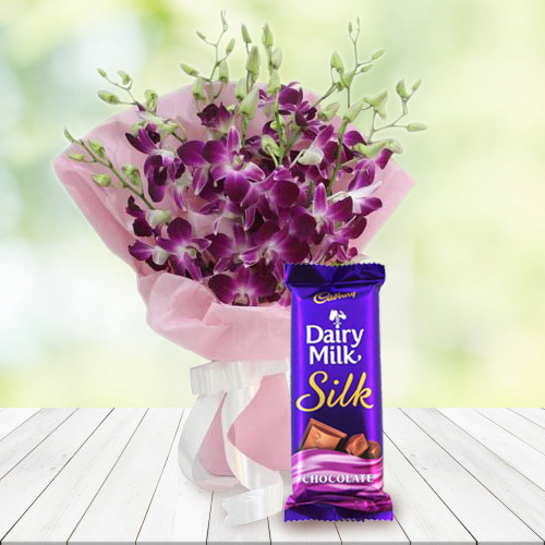 Blessed Birthday Wishes Combo of Dairy Milk Silk and Orchids Bouquet Blessed Birthday Wishes Combo of Dairy Milk Silk and Orchids Bouquet