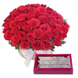 Astounding Red Roses with yummy Kaju Barfi Astounding Red Roses with yummy Kaju Barfi