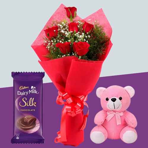 Eye-Catching Red Roses Bouquet with Teddy N Cadbury Silk Eye-Catching Red Roses Bouquet with Teddy N Cadbury Silk
