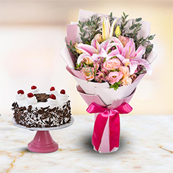 Mixed fresh Seasonal Flowers with festive Black Forest Cake Mixed fresh Seasonal Flowers with festive Black Forest Cake
