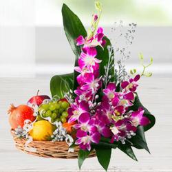 Pretty Flowers and 2 Kg. Fresh Fruits in Bamboo Basket Pretty Flowers and 2 Kg. Fresh Fruits in Bamboo Basket