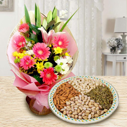 Radiant Seasonal Flowers with Dry Fruits Radiant Seasonal Flowers with Dry Fruits