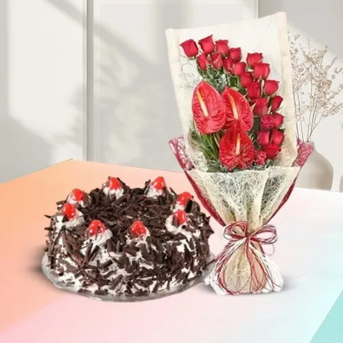 Captivating Red Roses n Anthodium Bouquet with Black Forest Cake