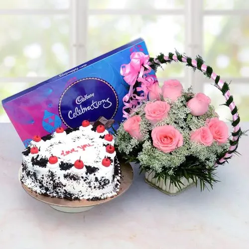 Stunning Combo of Black Forest Cake with Pink Rose Bouquet n Cadbury Chocolates