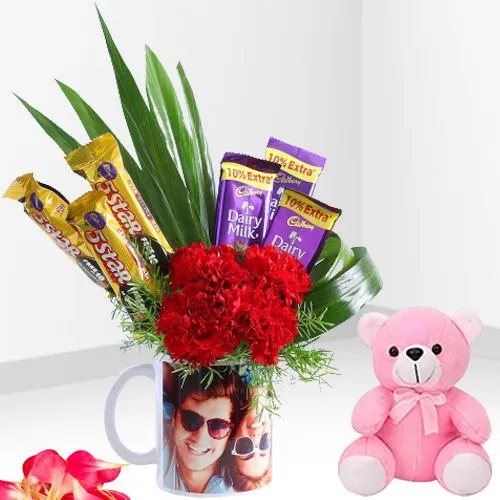 Finest Personalized Photo Mug of Carnations n Cadbury Chocolates with Soft Teddy