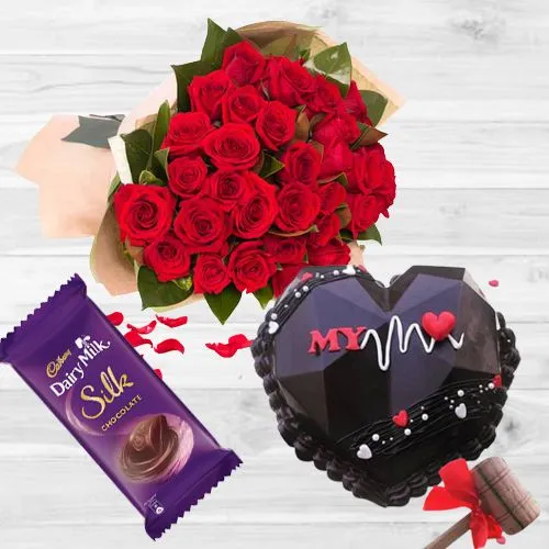 Splendid Combo of Chocolaty Heart Hammer Cake, Roses Bouquet n Cadbury Silk 	