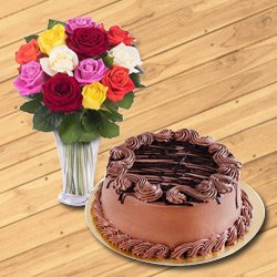 Magnificent 12 Mixed Roses in a Glass Vase with 1/2 Kg Chocolate Cake Magnificent 12 Mixed Roses in a Glass Vase with 1/2 Kg Chocolate Cake